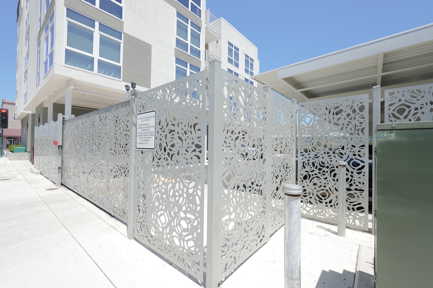 Decorative perforated steel screen fencing